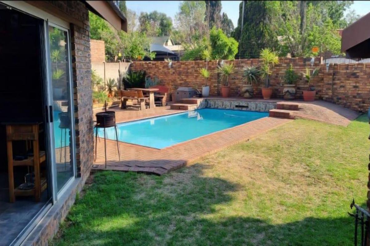 Neat 3-Bedroom Home with Pool & Income-Generating Flatlet - Photo 4