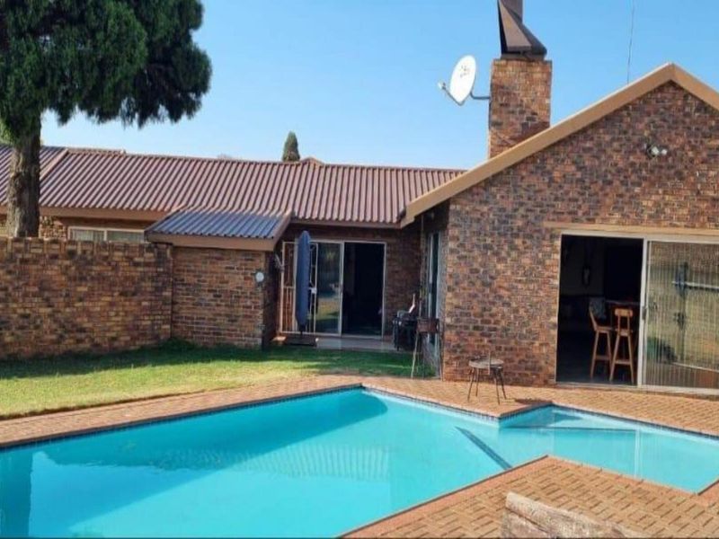 Neat 3-Bedroom Home with Pool & Income-Generating Flatlet - Photo 1