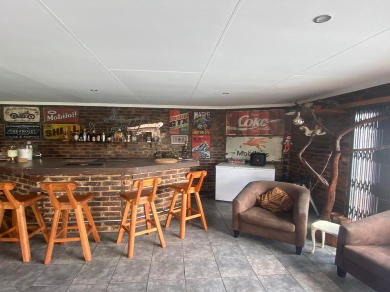 Neat 3-Bedroom Home with Pool & Income-Generating Flatlet - Photo 7