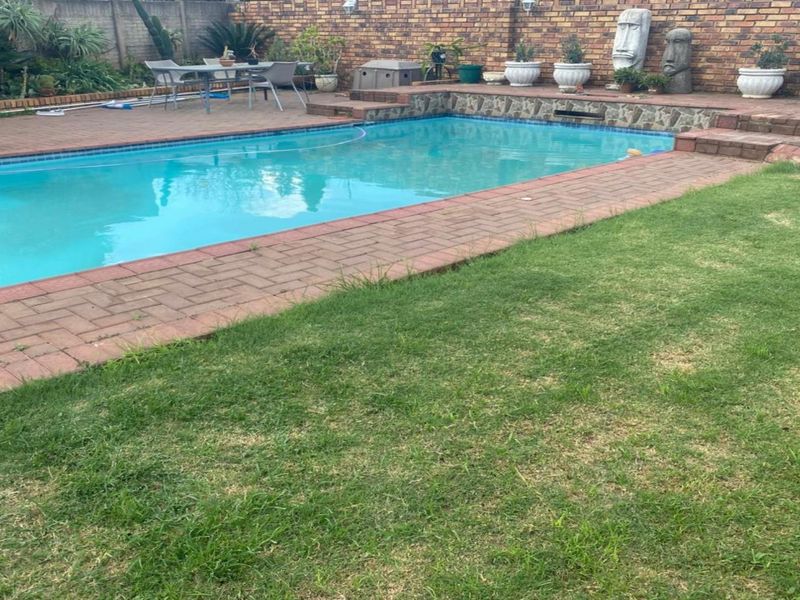 Neat 3-Bedroom Home with Pool & Income-Generating Flatlet - Photo 2