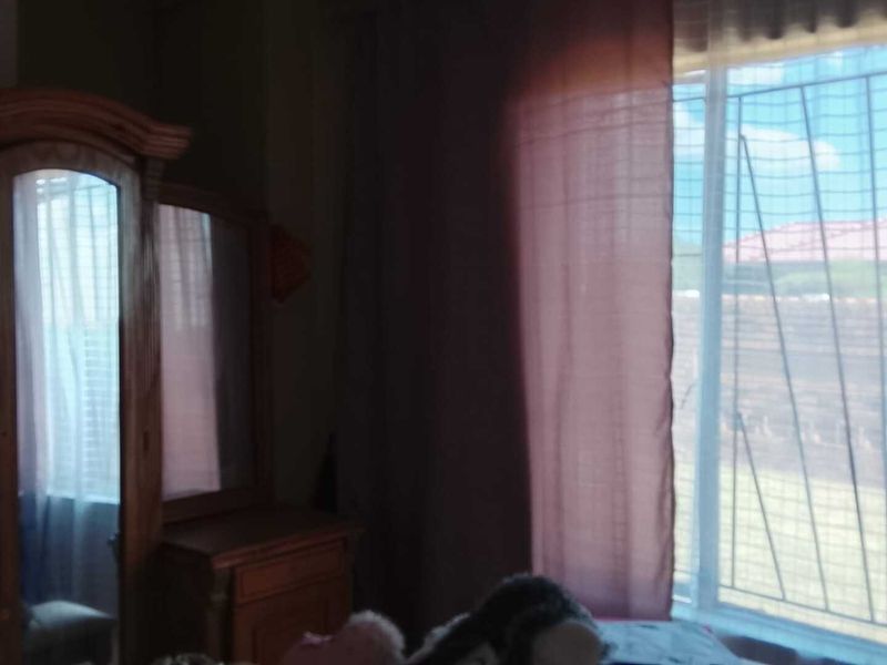 Three-bedroom home - Photo 7