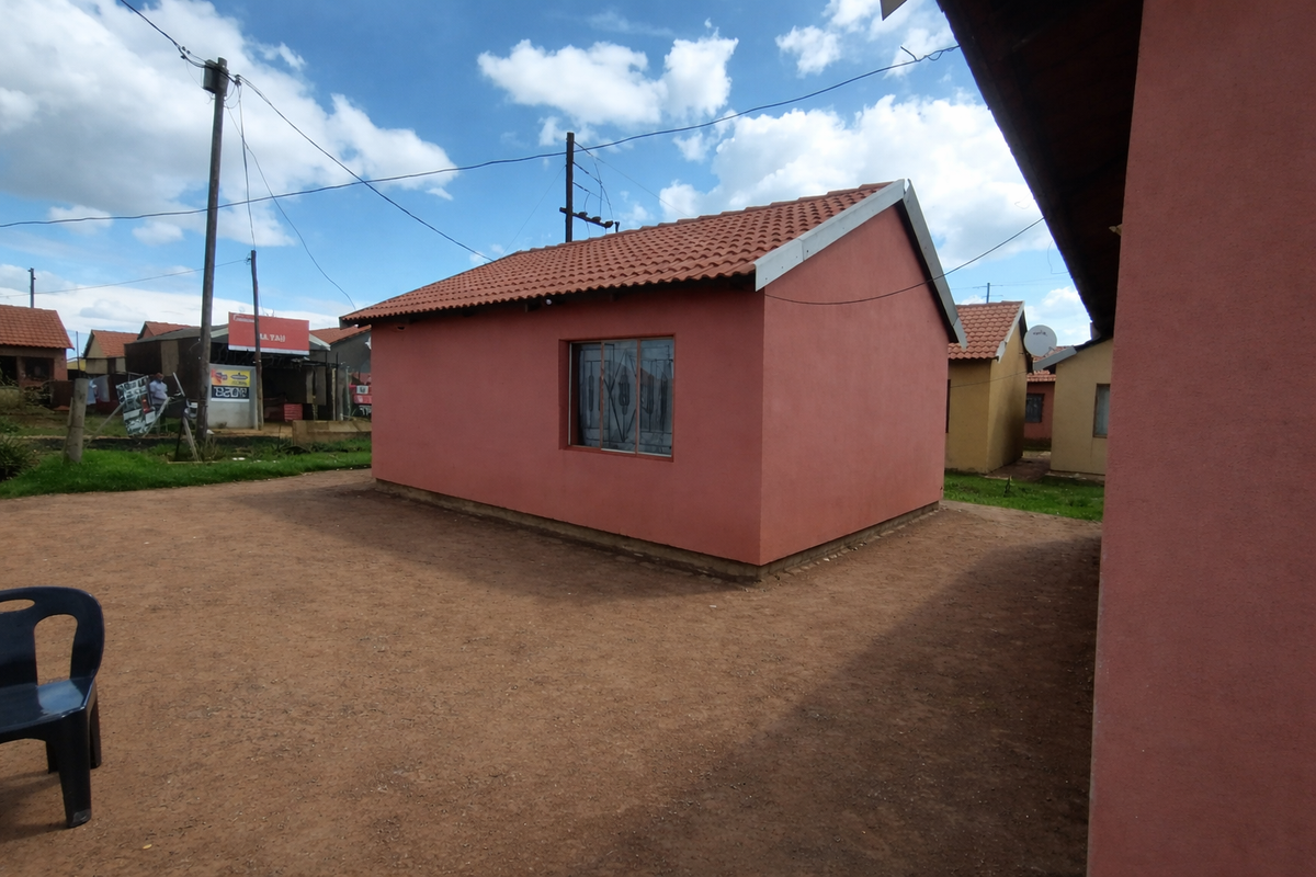 Perfect for families or Investors- two houses, one-yard, endless possibilities - Photo 2
