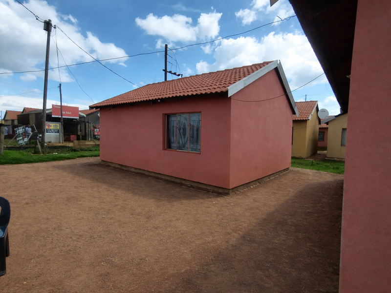 Perfect for families or Investors- two houses, one-yard, endless possibilities - Photo 2