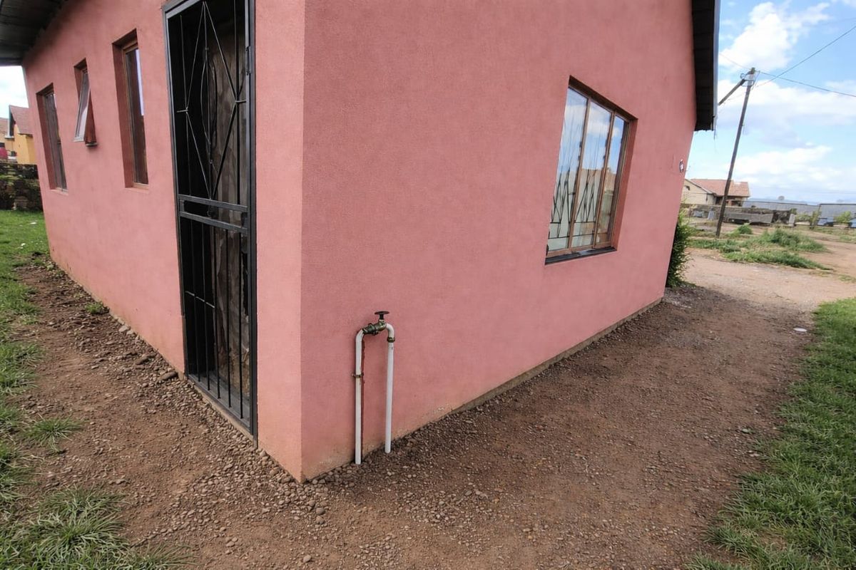 Perfect for families or Investors- two houses, one-yard, endless possibilities - Photo 3