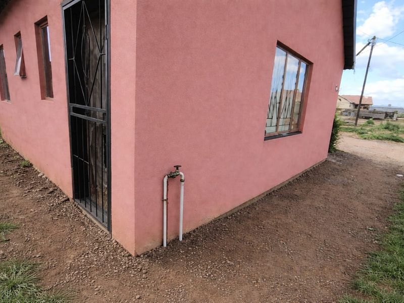 Perfect for families or Investors- two houses, one-yard, endless possibilities - Photo 3