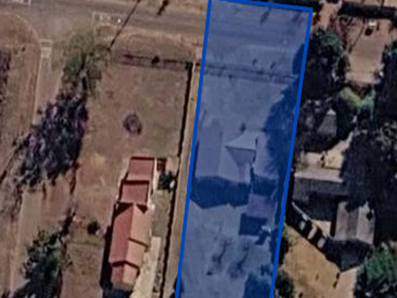 An aerial satellite view highlighting the residential property boundary and its position within the neighborhood.