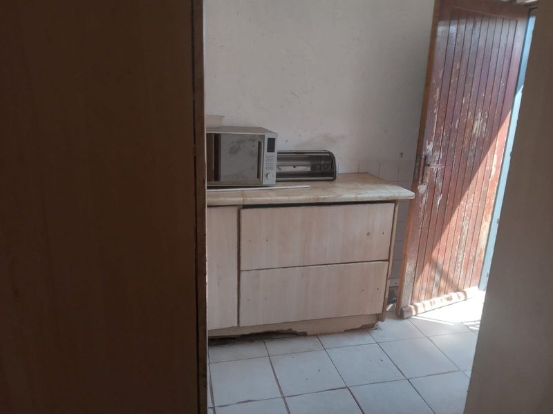 Well-Maintained Two-Bedroom Home with Extra Income Potential - Photo 10