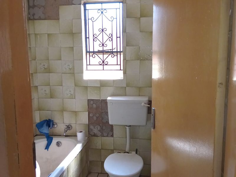 Well-Maintained Two-Bedroom Home with Extra Income Potential - Photo 5