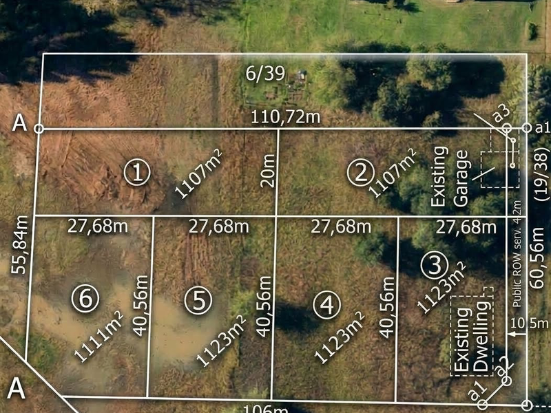 An aerial site plan showing the subdivision of residential land into six plots, including the location of an existing dwelling and garage.