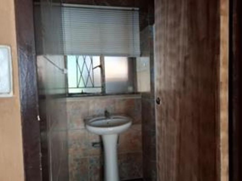 Spacious 4-Bedroom Family Home with Great Potential in a Neat Area - Photo 9