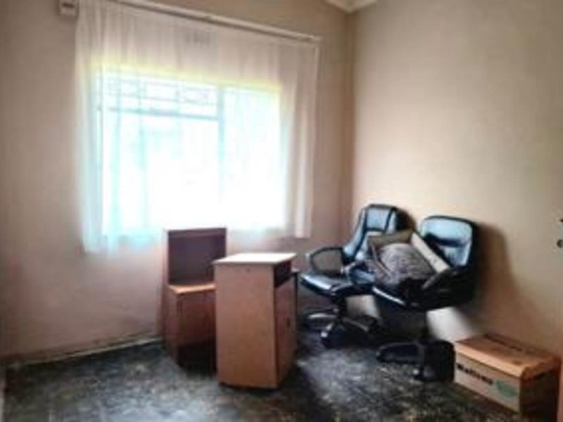 Spacious 4-Bedroom Family Home with Great Potential in a Neat Area - Photo 6