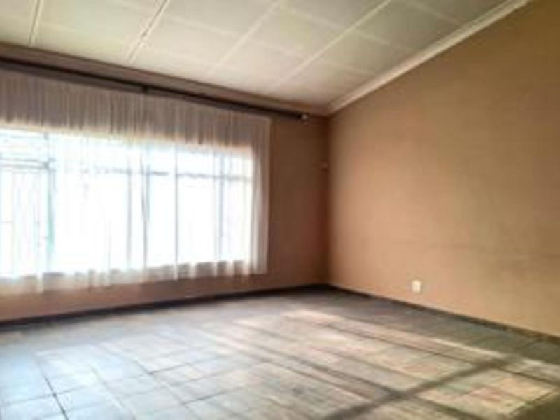 Spacious 4-Bedroom Family Home with Great Potential in a Neat Area - Photo 7