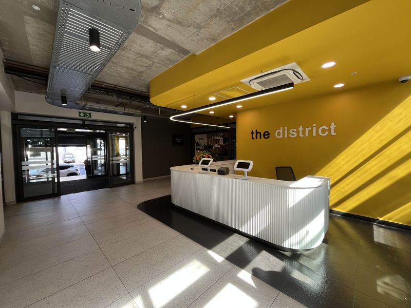 Panoramic Corner Office with Wrap-Around Balcony in The District - Photo 4