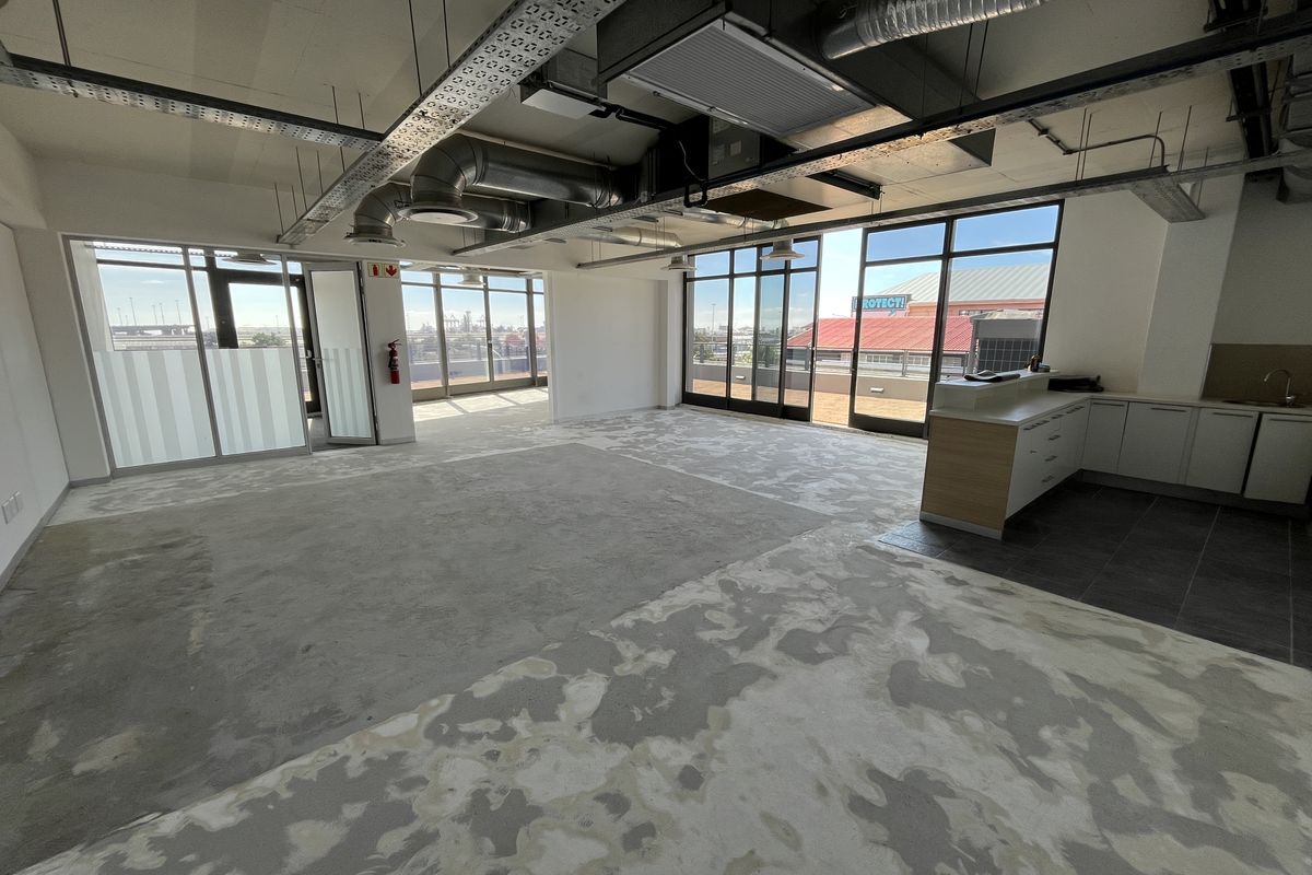 Panoramic Corner Office with Wrap-Around Balcony in The District - Photo 2