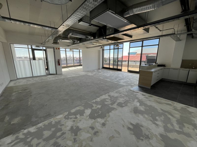 Panoramic Corner Office with Wrap-Around Balcony in The District - Photo 2