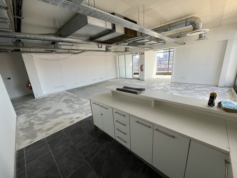 Panoramic Corner Office with Wrap-Around Balcony in The District - Photo 6