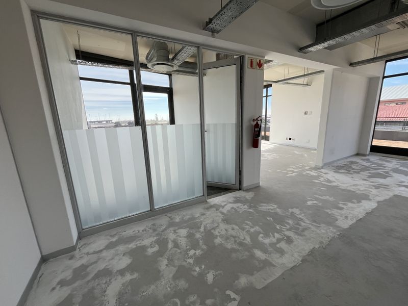 Panoramic Corner Office with Wrap-Around Balcony in The District - Photo 8