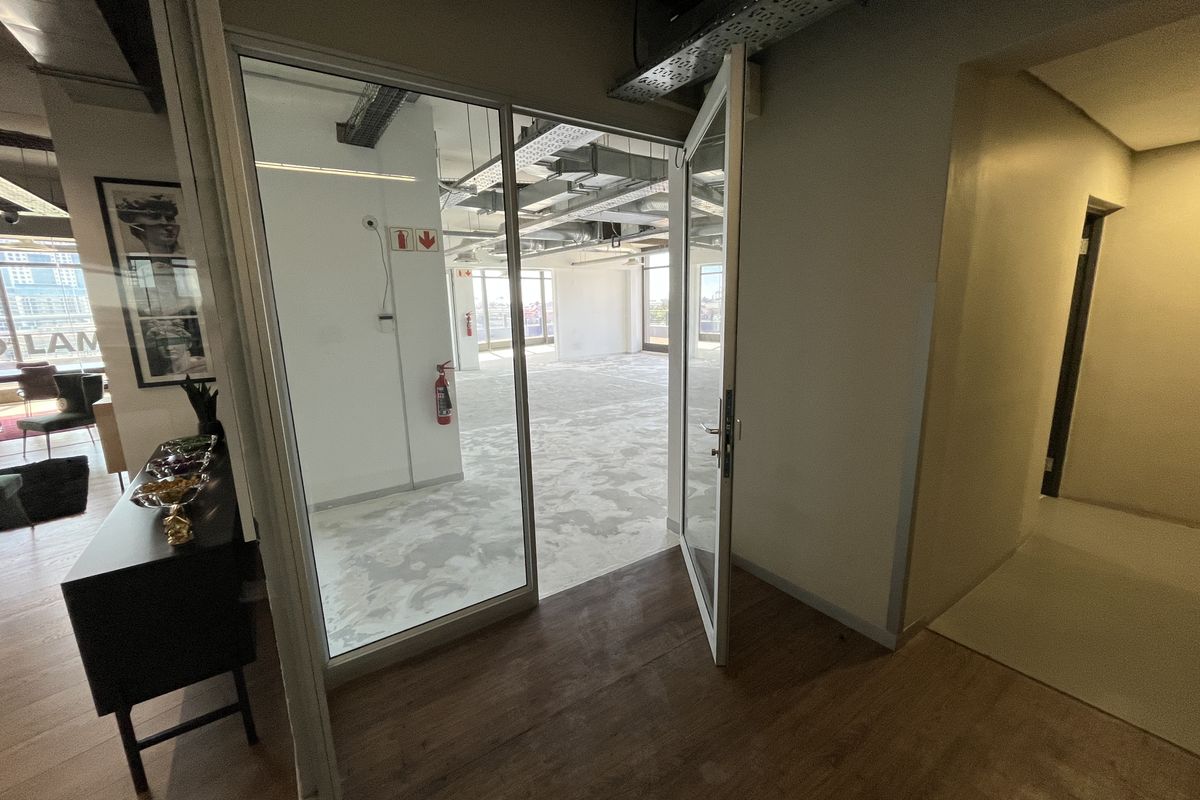 Panoramic Corner Office with Wrap-Around Balcony in The District - Photo 5