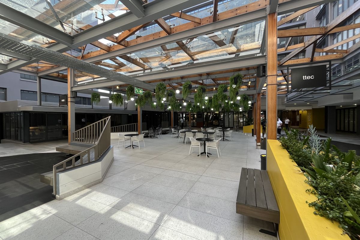 Panoramic Corner Office with Wrap-Around Balcony in The District - Photo 3