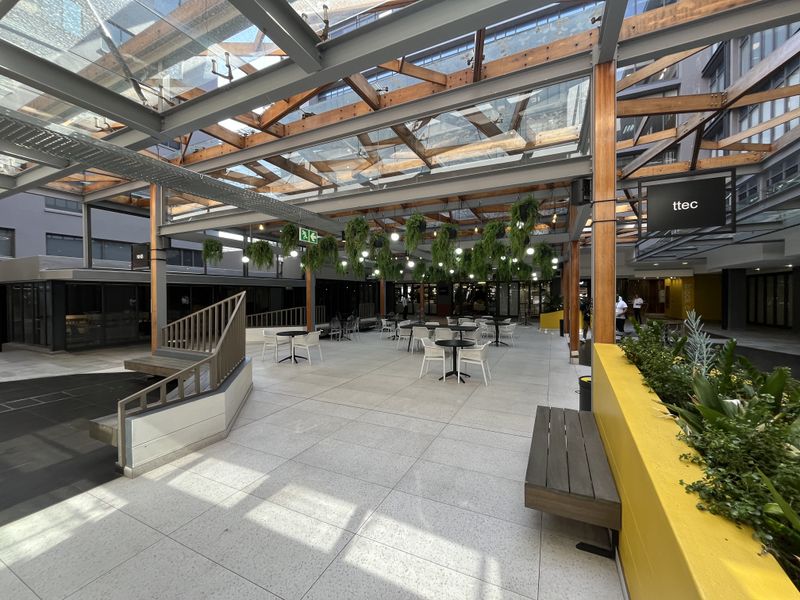 Panoramic Corner Office with Wrap-Around Balcony in The District - Photo 3