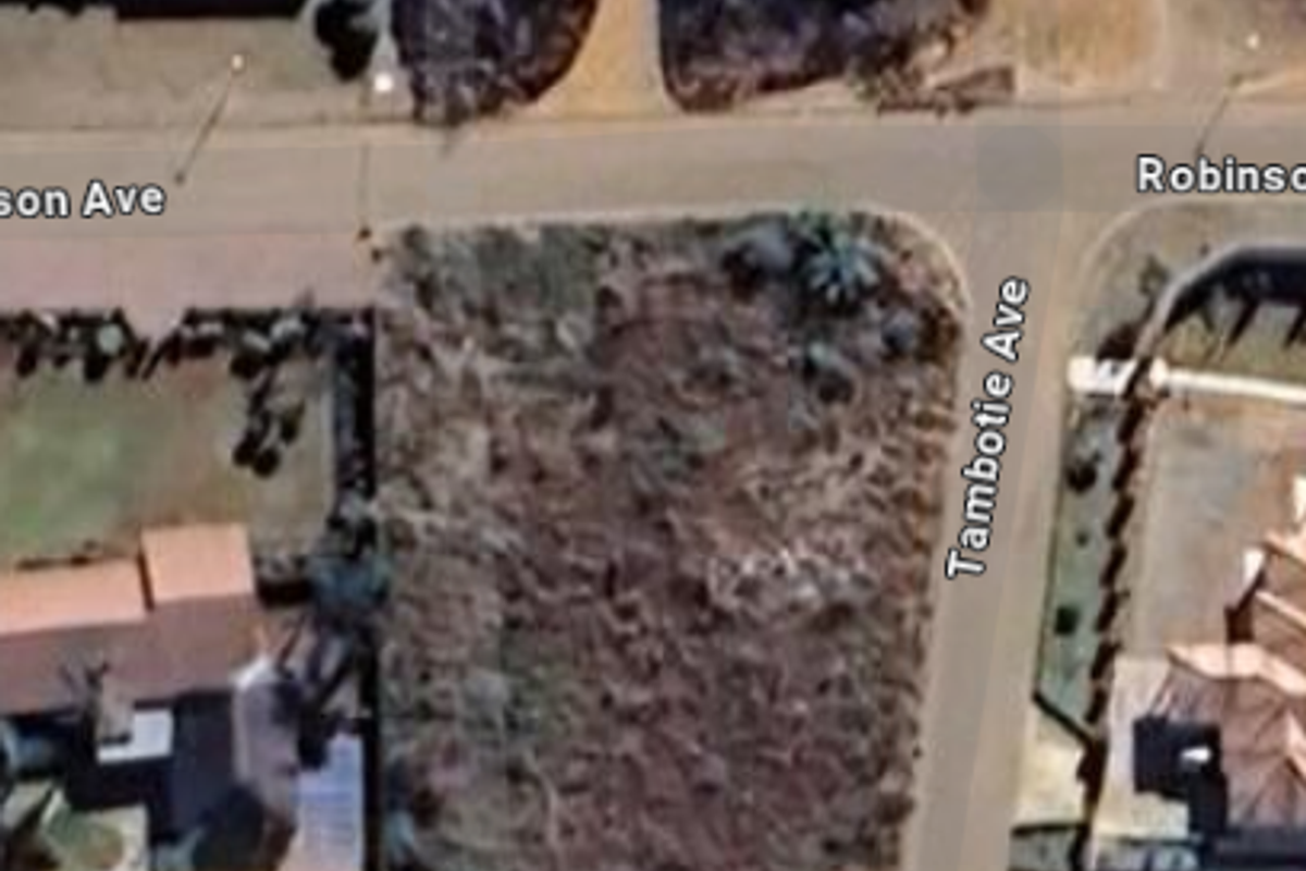 An aerial view of a vacant residential plot situated at the corner of Robinson and Tambotie Avenue.
