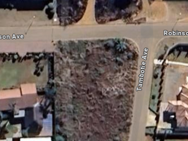 An aerial view of a vacant residential plot situated at the corner of Robinson and Tambotie Avenue.