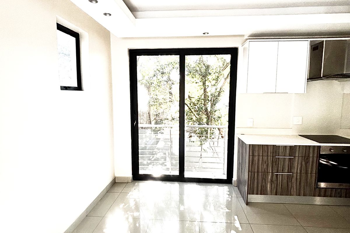 The OUTSTANDING ULTRA MODERN 2 BED 2.5 BATH SANDTON MODERN APARTMENt - Photo 5