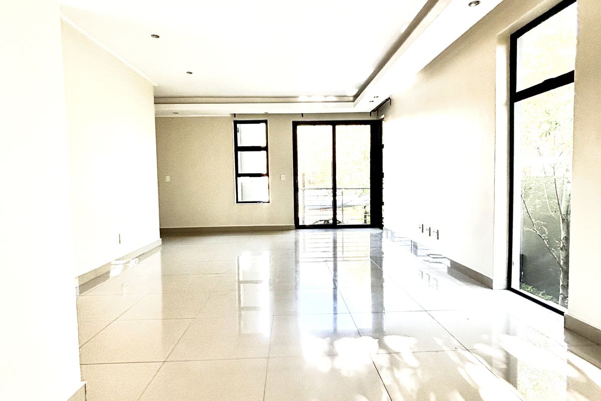 The OUTSTANDING ULTRA MODERN 2 BED 2.5 BATH SANDTON MODERN APARTMENt - Photo 2