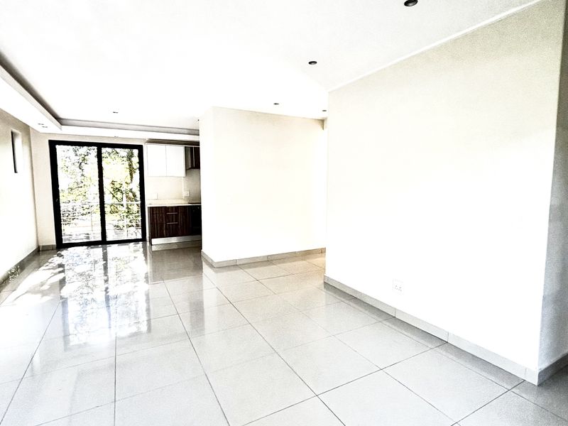 The OUTSTANDING ULTRA MODERN 2 BED 2.5 BATH SANDTON MODERN APARTMENt - Photo 7