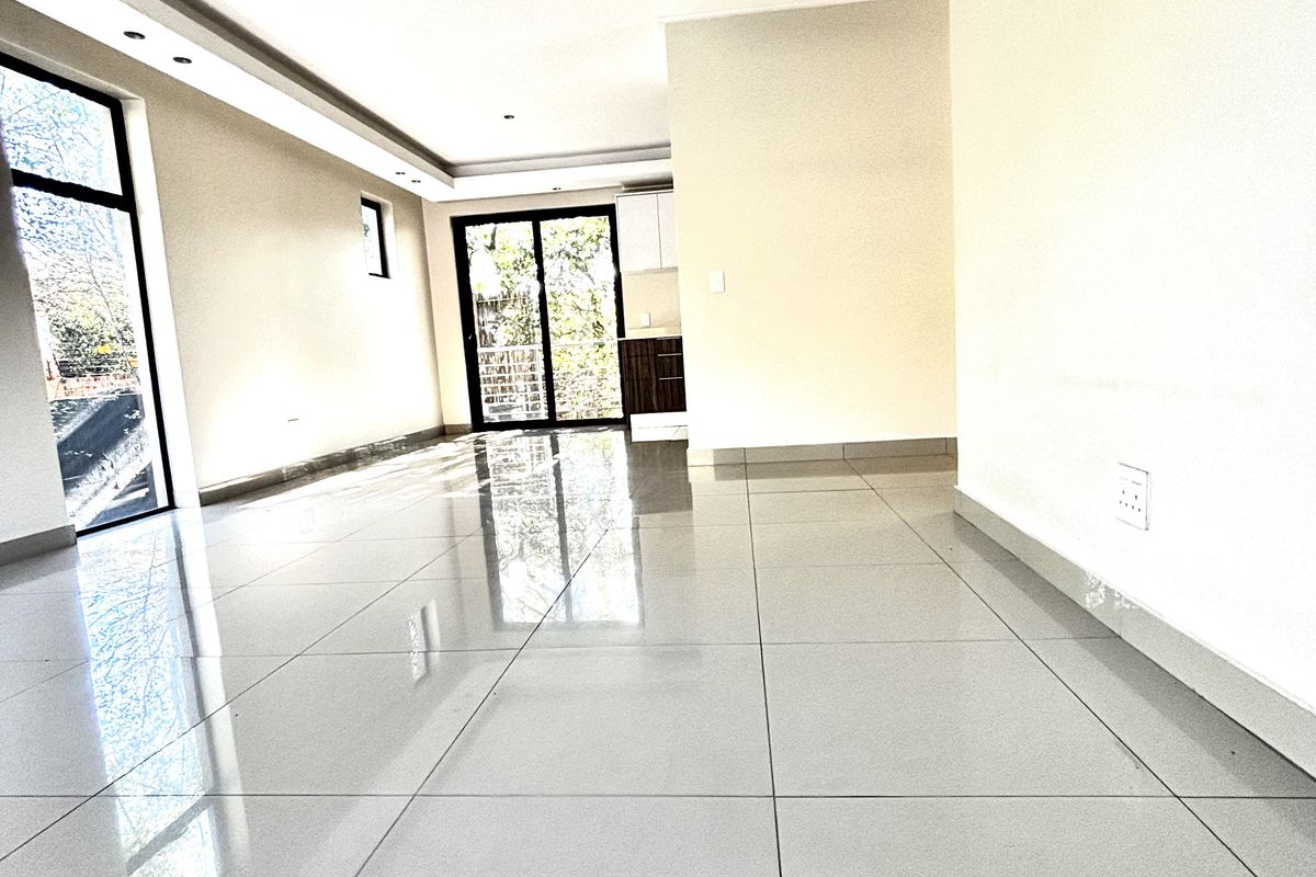 The OUTSTANDING ULTRA MODERN 2 BED 2.5 BATH SANDTON MODERN APARTMENt - Photo 3