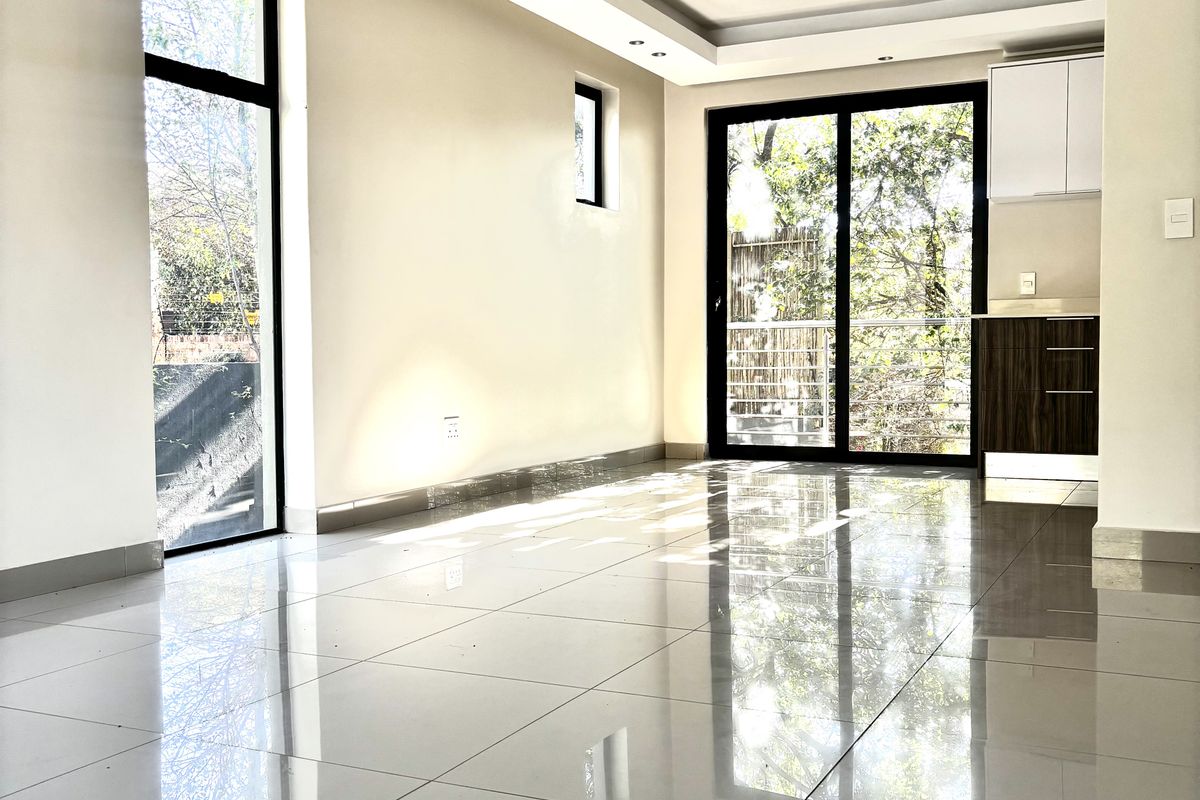 The OUTSTANDING ULTRA MODERN 2 BED 2.5 BATH SANDTON MODERN APARTMENt - Photo 4