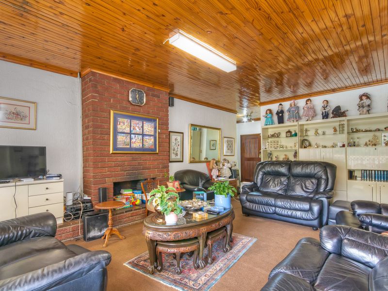 PRICE REDUCED....LARGE SECURE 8 BEDROOM FAMILY HOME AND A WORK FROM HOME OFFICE...A MUST TO SEE.... - Photo 6