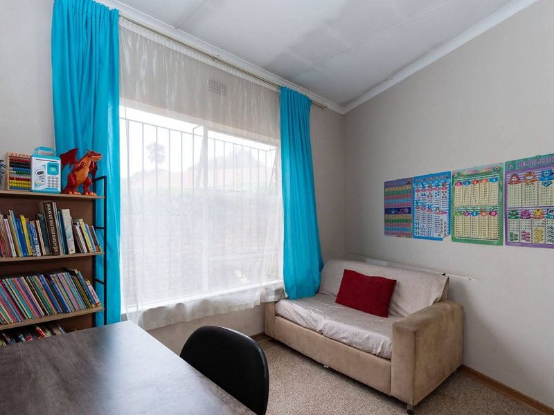 Your Family’s Next Chapter Starts Here – 6-Bedroom Home in Enclosed Area - Photo 6