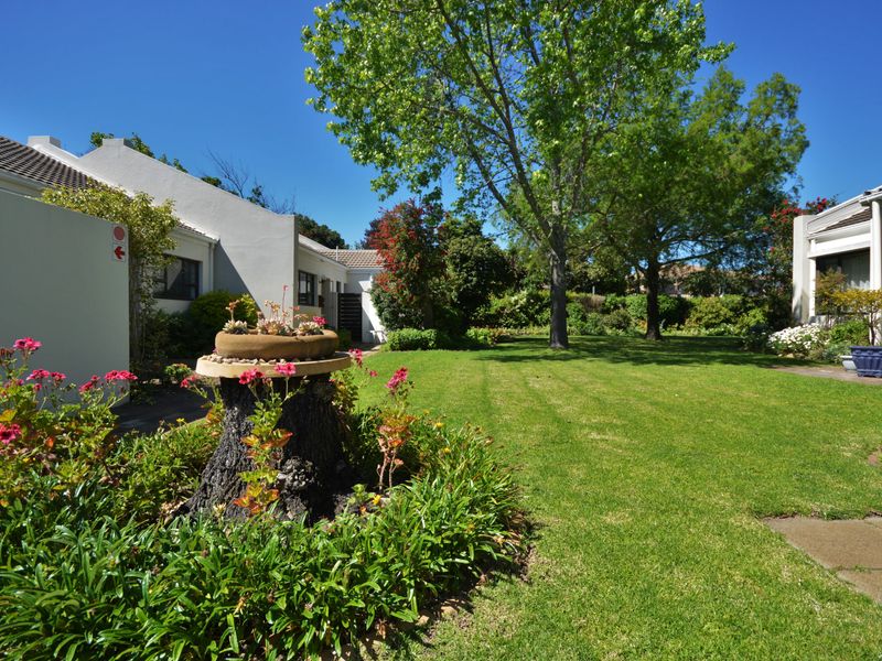 Retire in Style: Spacious 3-Bedroom Haven in Somerset West’s Premier Village - Photo 9