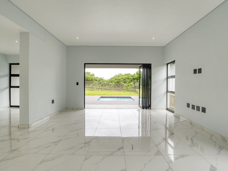 Elegant 3-Bedroom Home with Pool in Prestigious Palm Lakes Estate - Photo 5