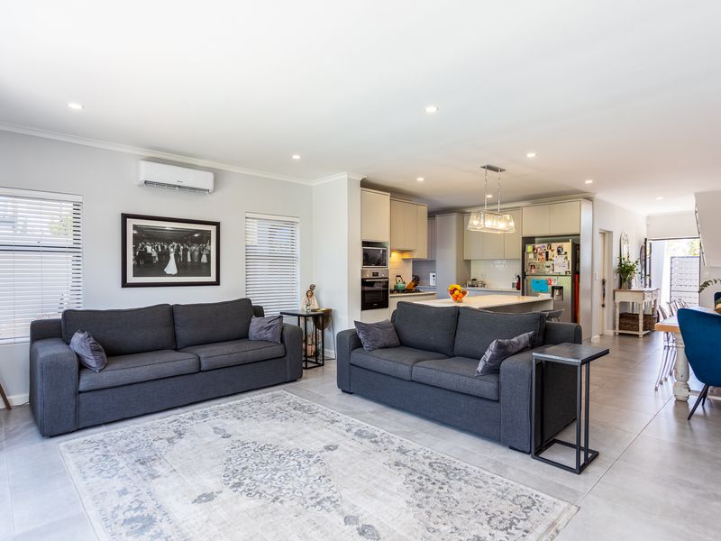 Step into the epitome of luxury and modern living with this impeccably maintained home - Photo 7