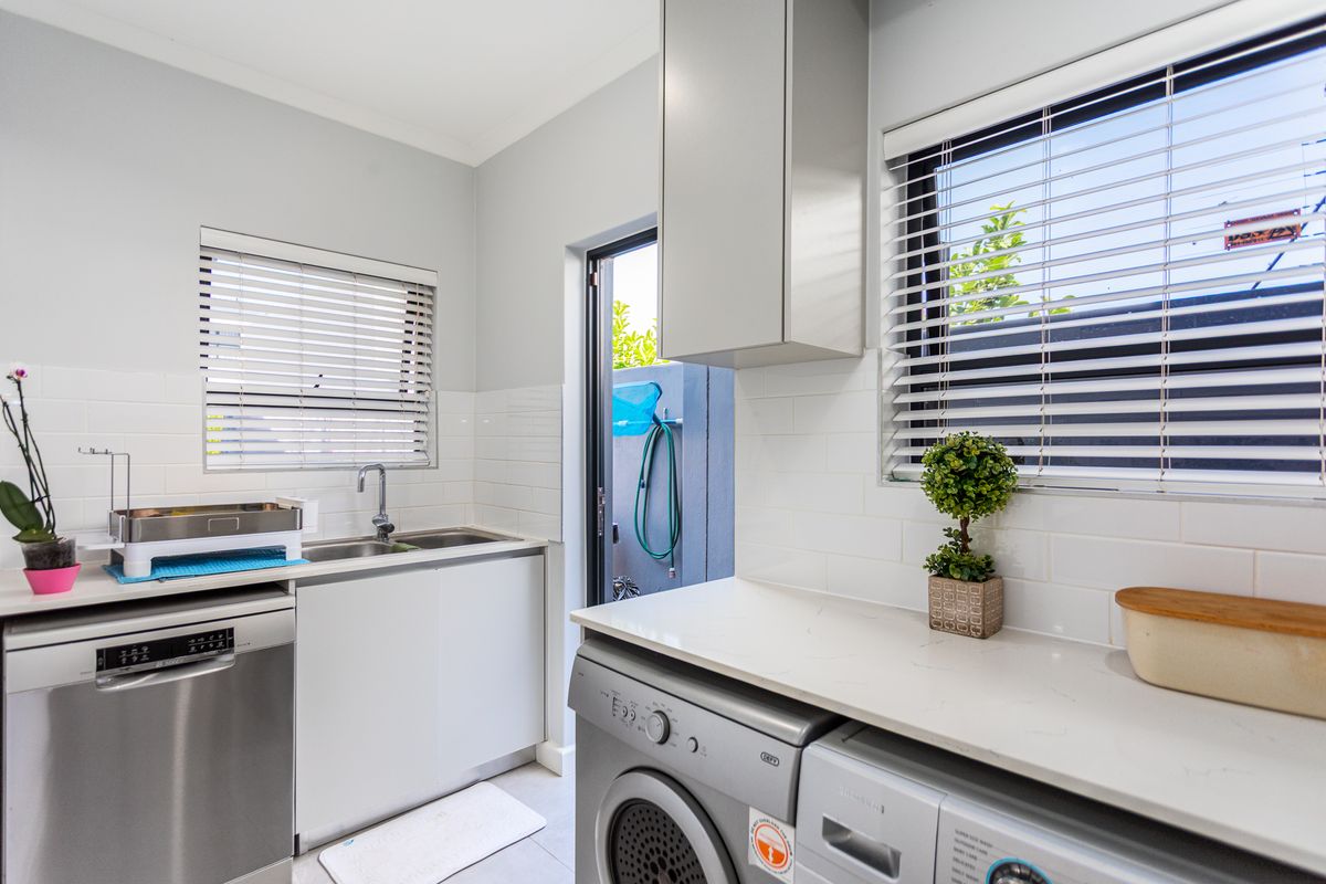 Step into the epitome of luxury and modern living with this impeccably maintained home - Photo 5