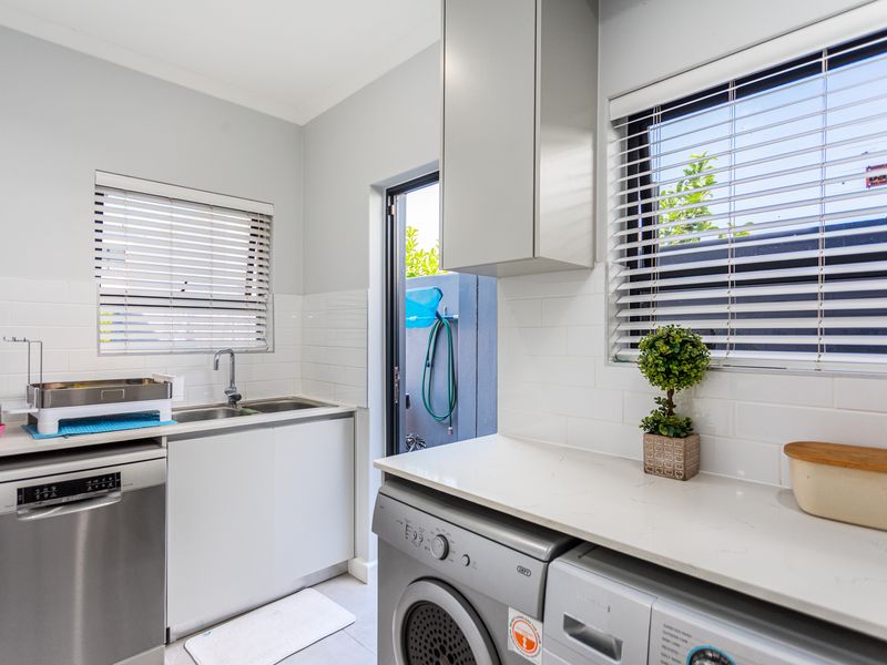 Step into the epitome of luxury and modern living with this impeccably maintained home - Photo 5