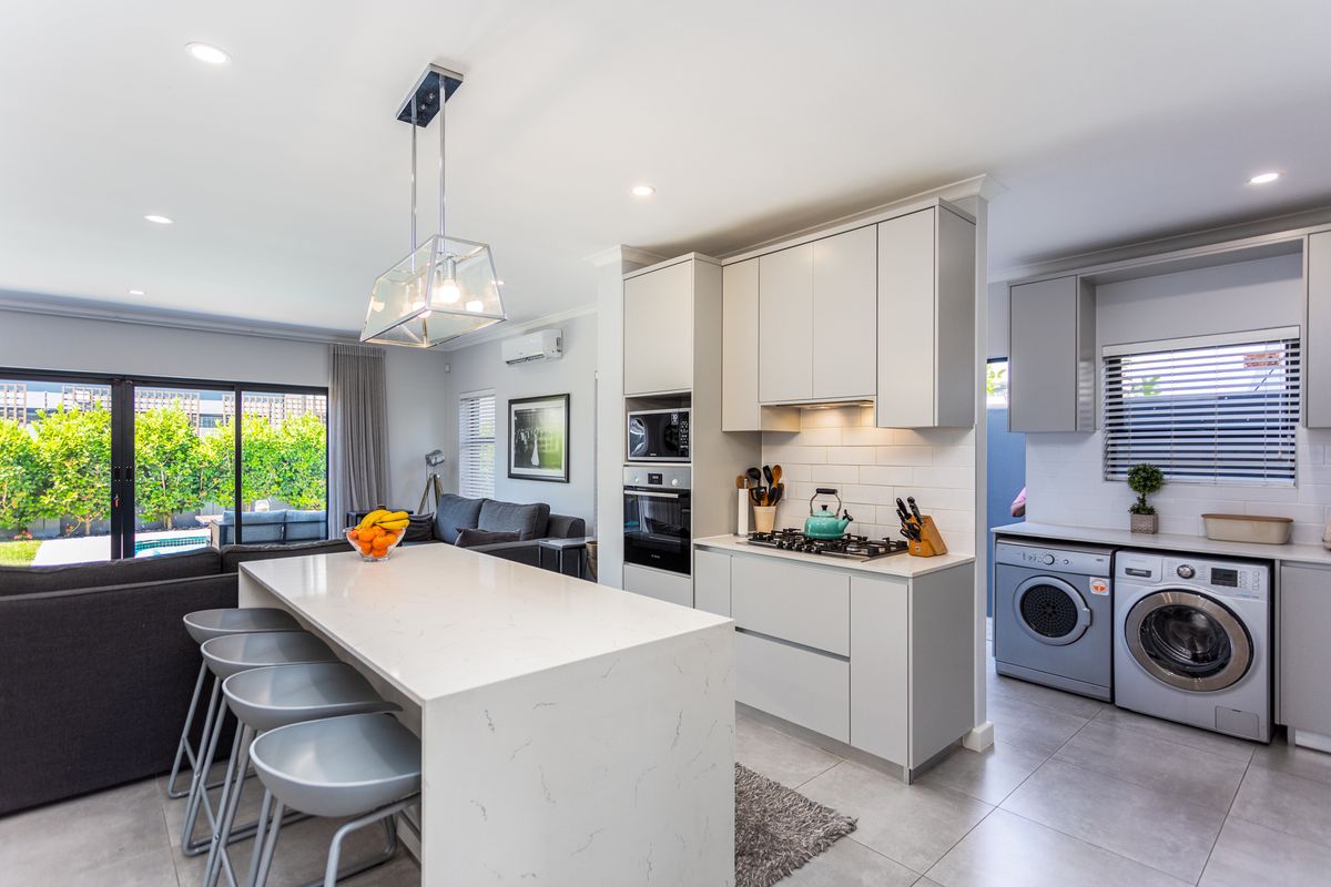 Step into the epitome of luxury and modern living with this impeccably maintained home - Photo 3