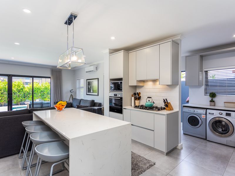 Step into the epitome of luxury and modern living with this impeccably maintained home - Photo 3