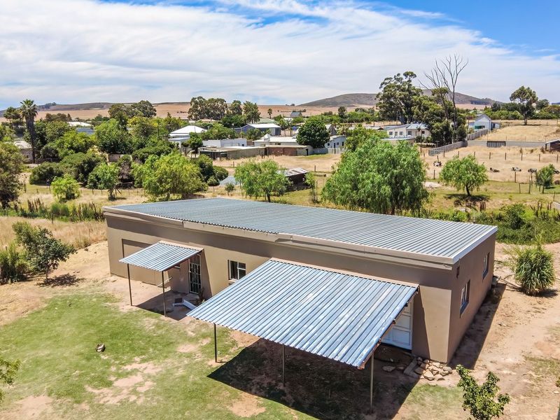 Tranquil Country Cottage with Stream and Bridge in Historic Hooikraal - Photo 3