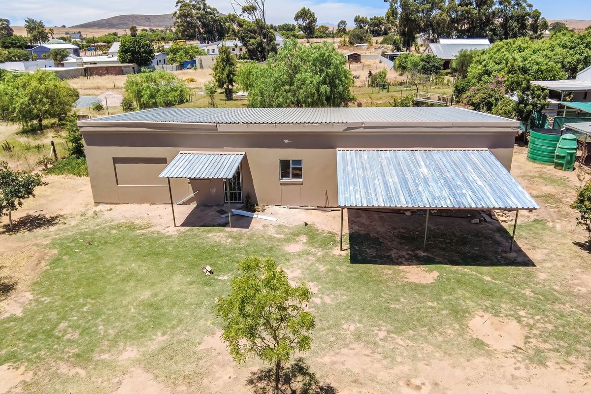 Tranquil Country Cottage with Stream and Bridge in Historic Hooikraal - Photo 4