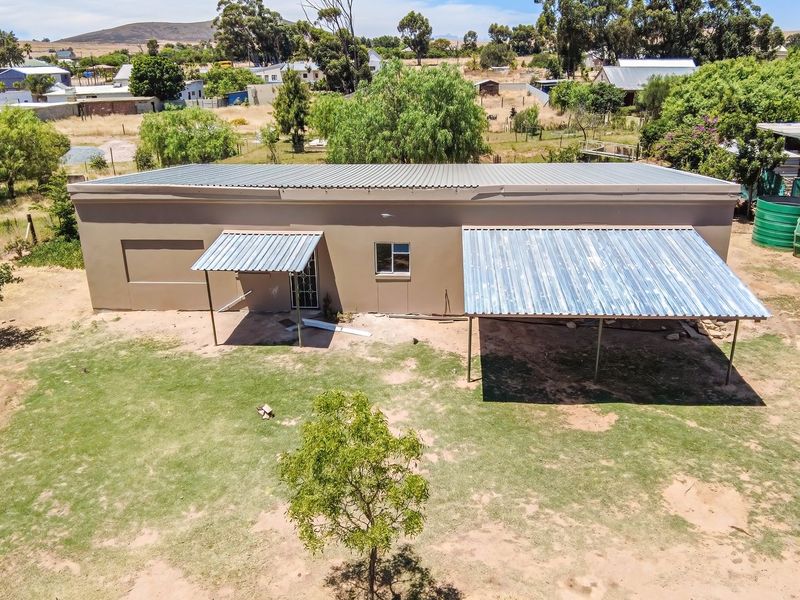 Tranquil Country Cottage with Stream and Bridge in Historic Hooikraal - Photo 4