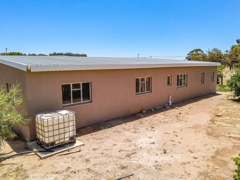 Tranquil Country Cottage with Stream and Bridge in Historic Hooikraal - Photo 9