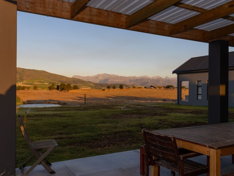 EQUESTRIAN ESTATE AT THE FOOTHILLS OF PAARL ROCK MOUNTAIN - Photo 5