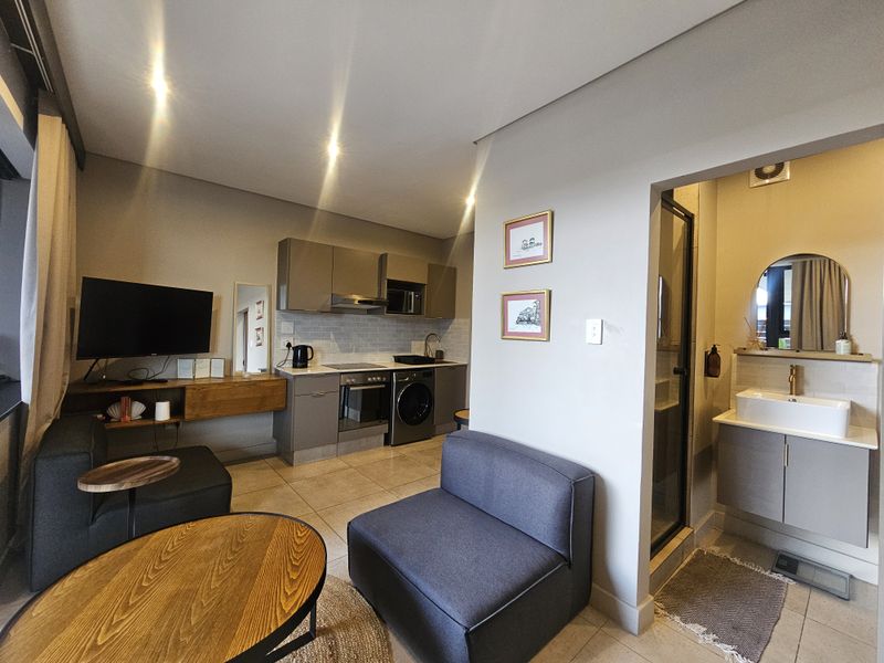 Modern 1-Bedroom Apartment with Skyline Views in the Heart of Sandton - Photo 3