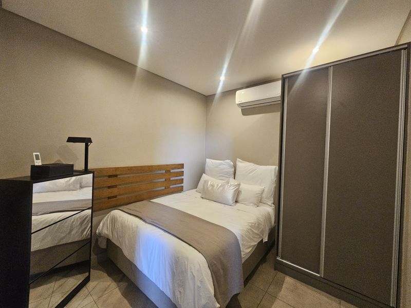 Modern 1-Bedroom Apartment with Skyline Views in the Heart of Sandton - Photo 8