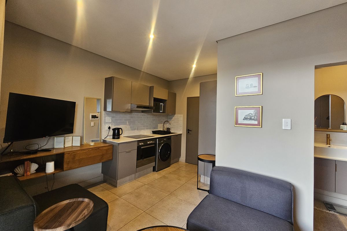 Modern 1-Bedroom Apartment with Skyline Views in the Heart of Sandton - Photo 4