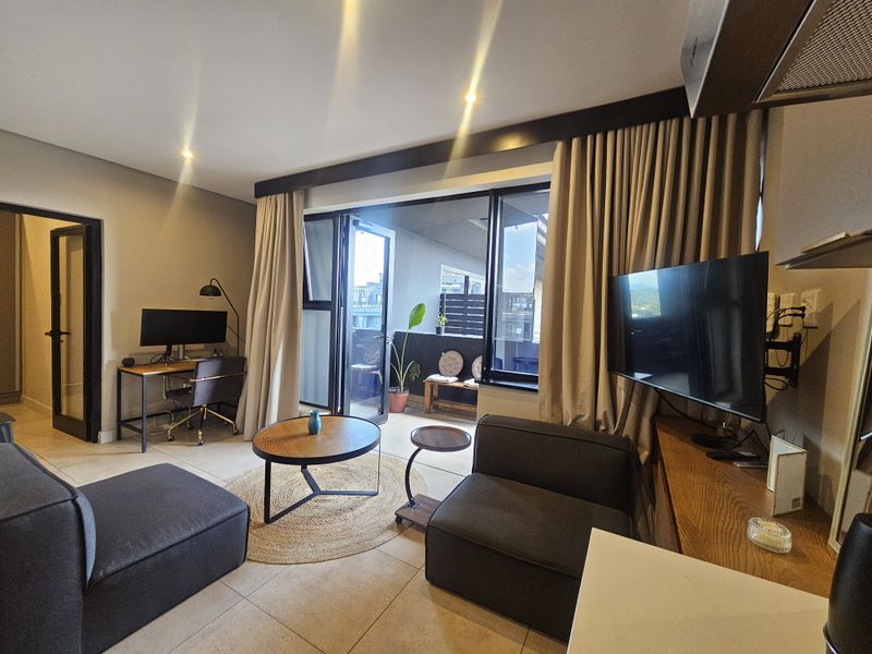 Modern 1-Bedroom Apartment with Skyline Views in the Heart of Sandton - Photo 2