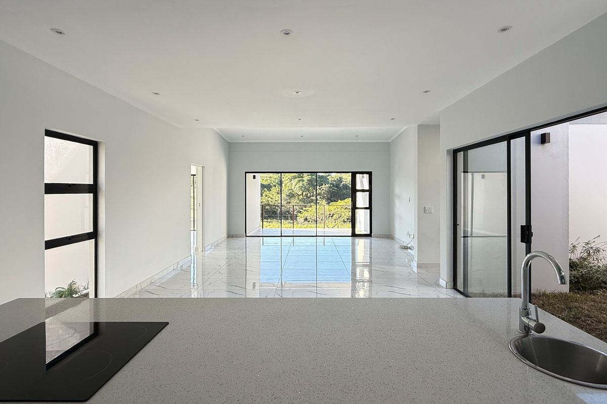 Modern 4-Bedroom Home in Palm Lakes Estate – Contemporary Living in a Natural Setting - Photo 5